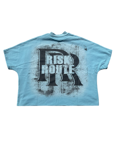 OBSESSED WITH RISK BLUE TEE